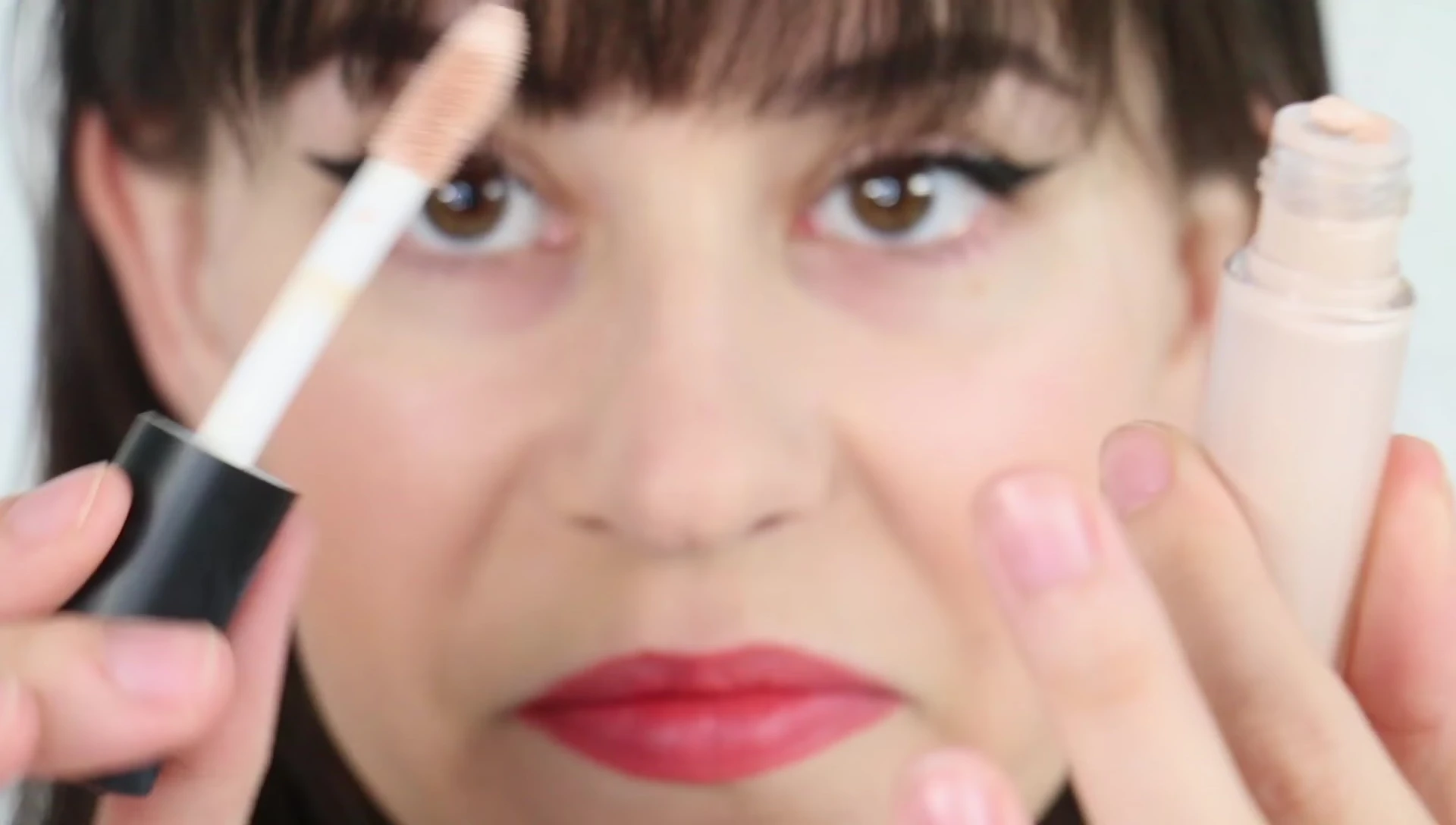 Close-up of the two ELF concealer tubes side-by-side