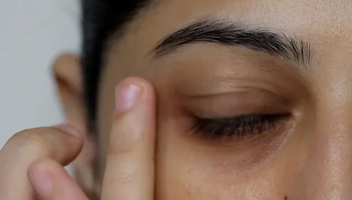 Use a color corrector (if needed) to neutralize any discoloration before applying concealer.