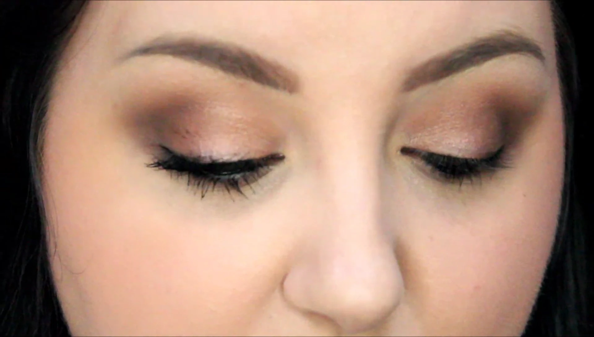 The reviewer showing off her lashes after application.