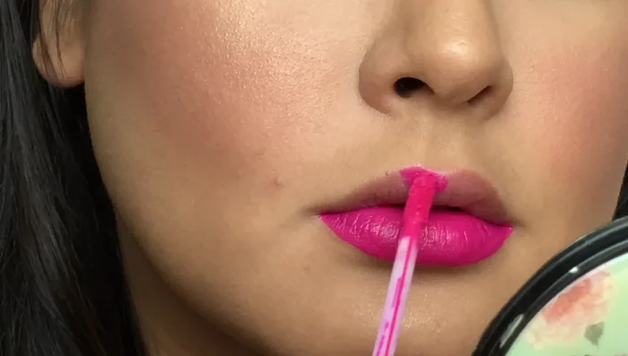 Apply to the upper lip, starting with the Cupid's bow.