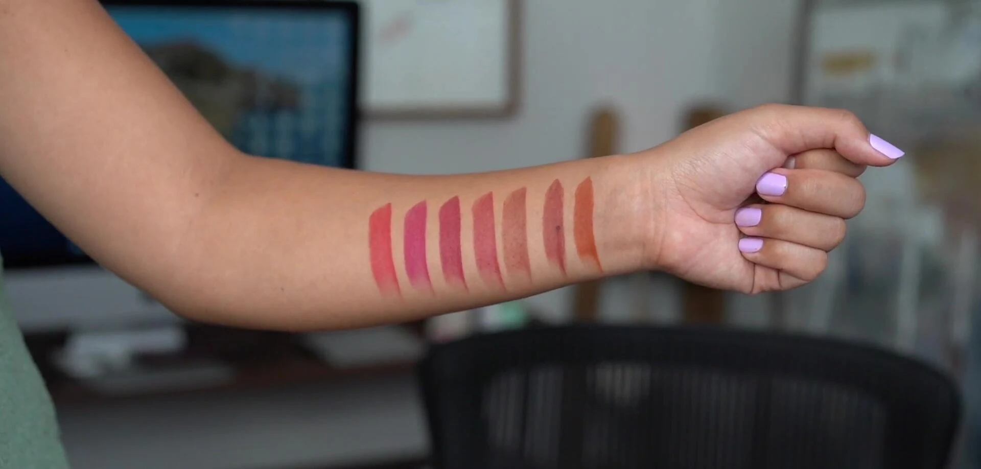 Swatches of Harissa on arm and lips