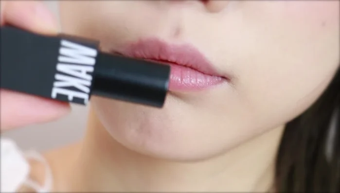 Apply a darker lipstick to the inner part of your lips.