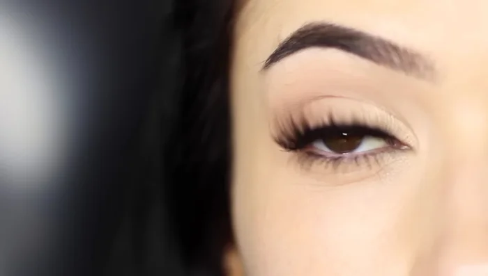 Apply mascara or false lashes for a complete look.