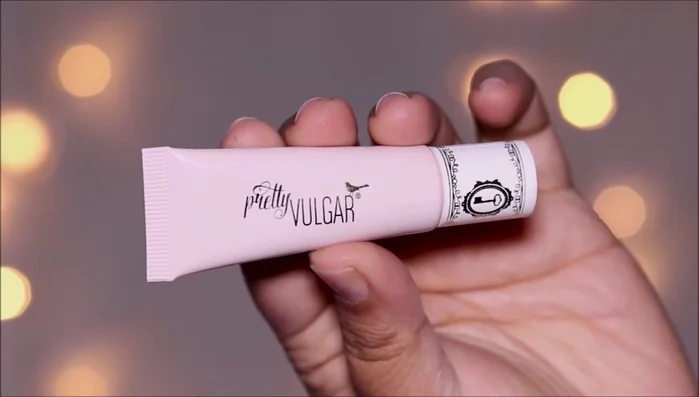 Apply an eye primer to create a smooth base, fill in fine lines, and prevent creasing. Focus on the lash line area.