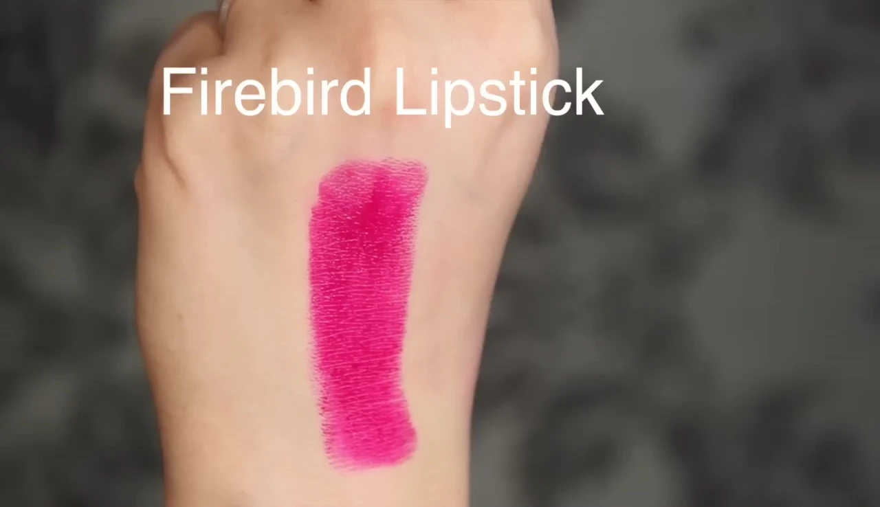 Model wearing Firebird lipstick