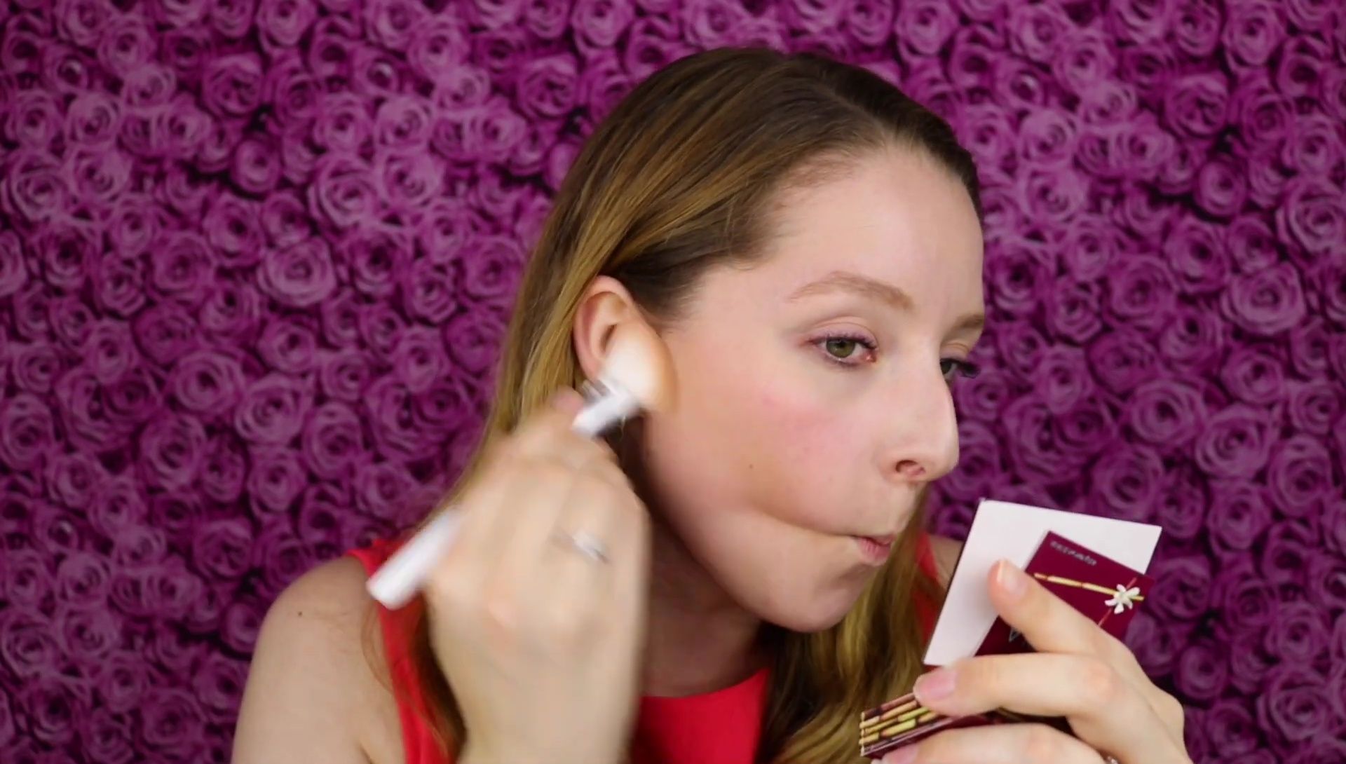 The reviewer's face after applying the bronzer, showcasing the blending.