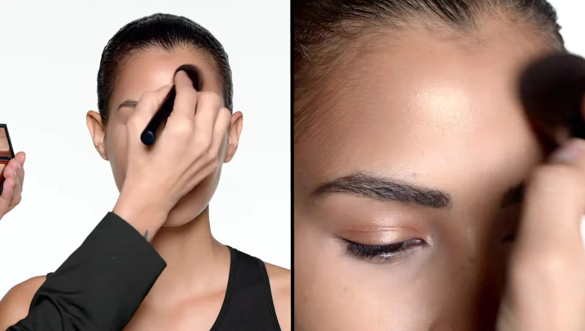 Applying bronzer to the forehead and cheekbones.