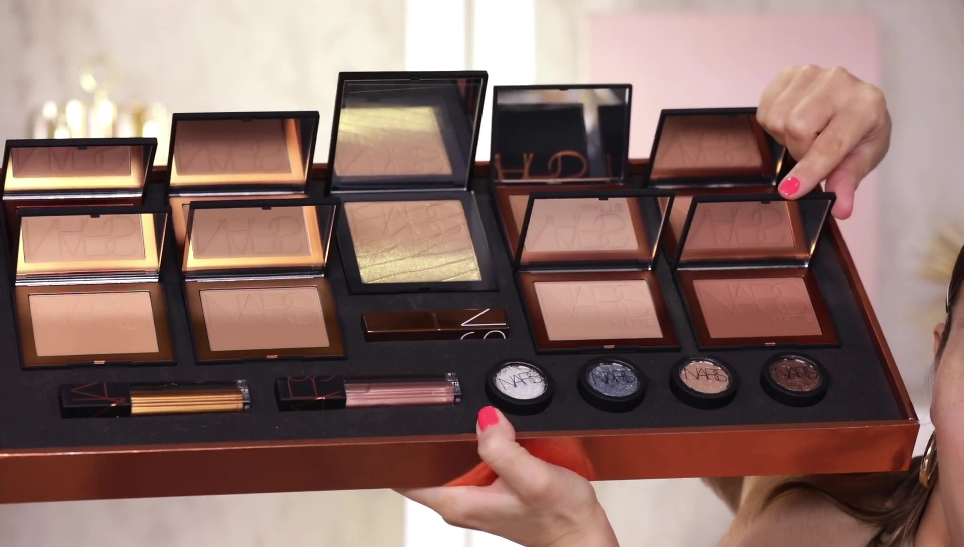 The reviewer displays the shimmery bronzers.