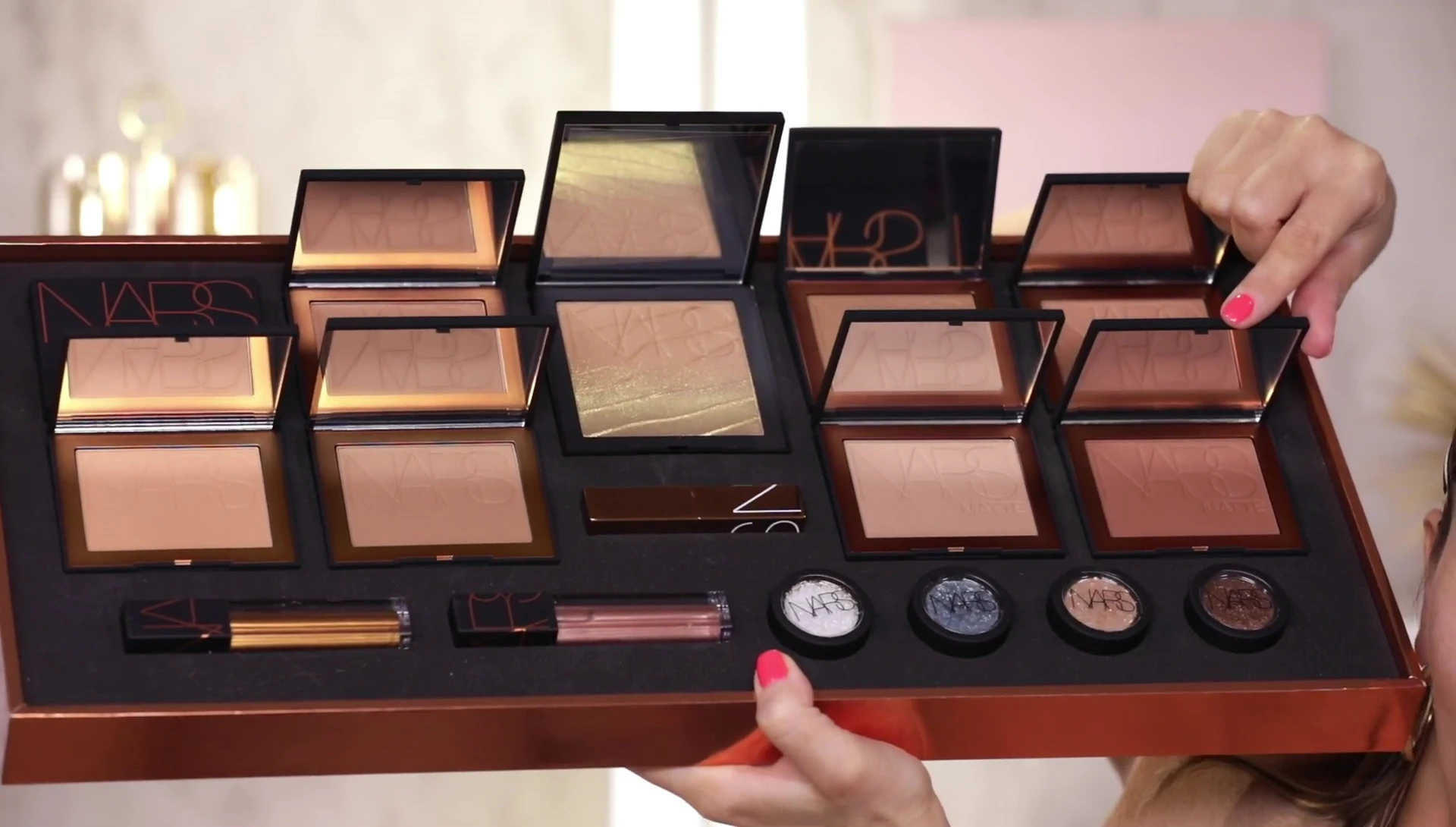 The reviewer shows the matte bronzers.
