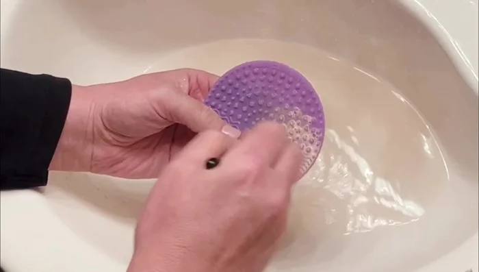 For dual-sided brushes, lay them flat on a towel and clean both sides gently.