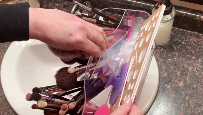 Gather your brushes, sponges, soap, and cleaning tools.