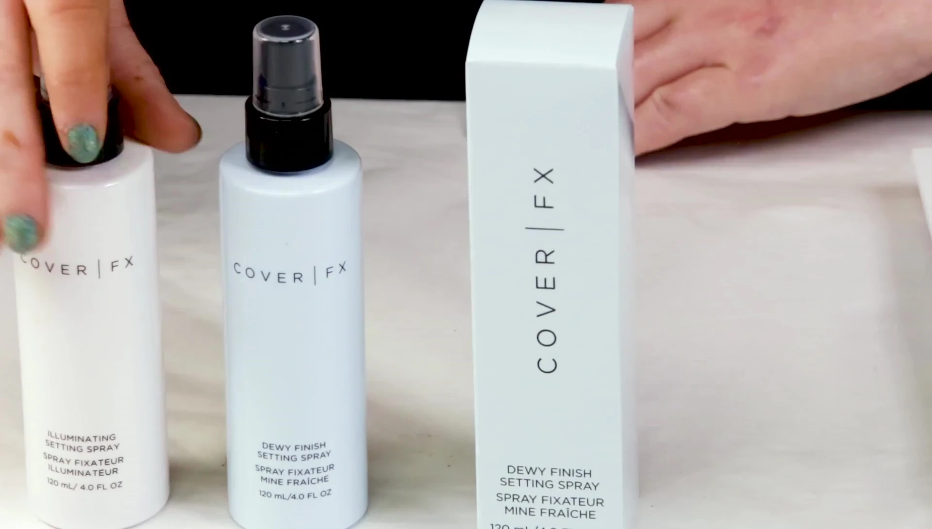 The reviewer demonstrating the spray application