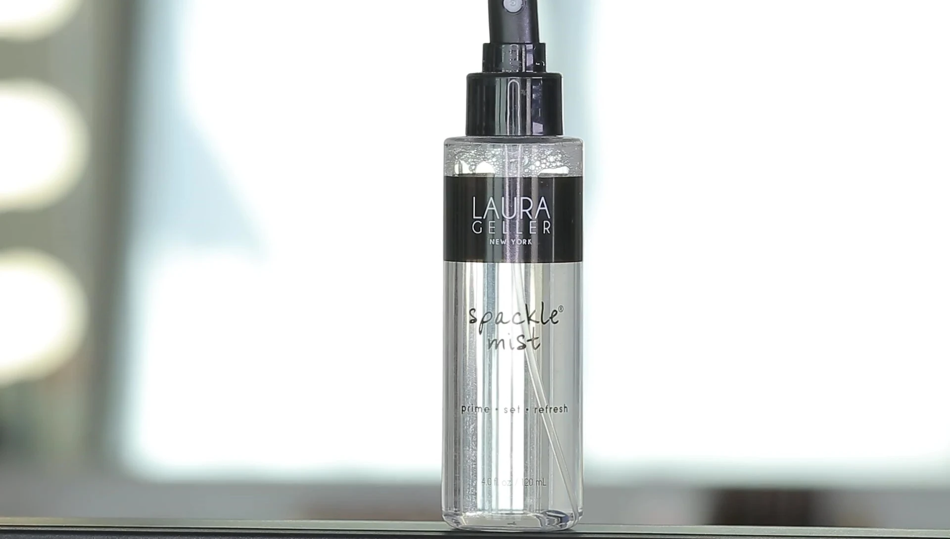 Laura Geller Spackle Mist bottle