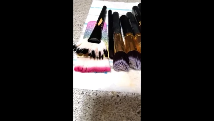 Optional: Add a small amount of vinegar to the rinse water and let the brushes soak for a few more minutes.