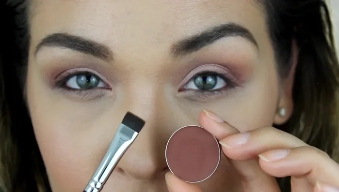 Apply “Peach Tea” eyeshadow to the lower lash line using a flat definer brush. Optionally, use the pro pencil brush to blend and soften the look, adding “Warm Peach” for diffusion.