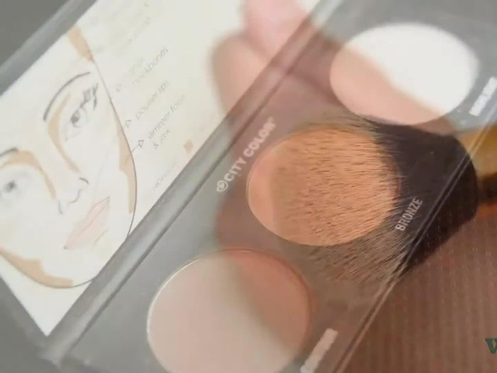 Blend bronzer under your hairline using small circular motions.