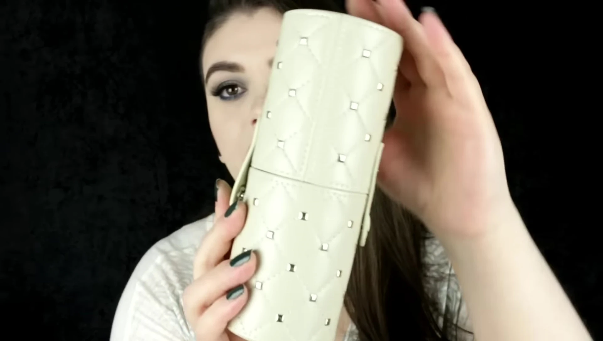 The case open, showcasing the brushes inside