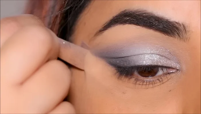 Stamp the dark eyeshadow (Button Nose) underneath the liner and blend.