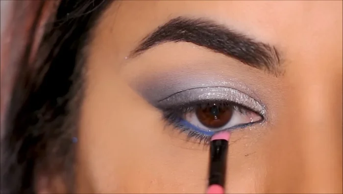 Stamp the dark eyeshadow (Button Nose) underneath the liner and blend.