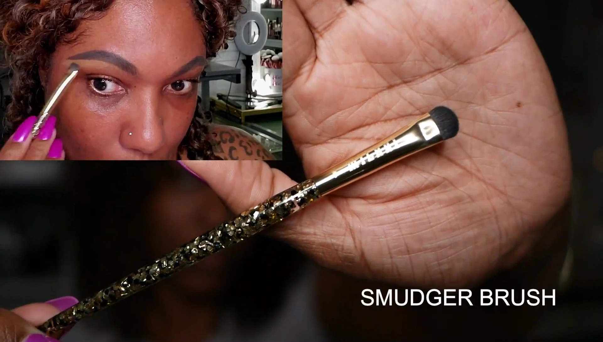 The smudger brush being used for concealer application.