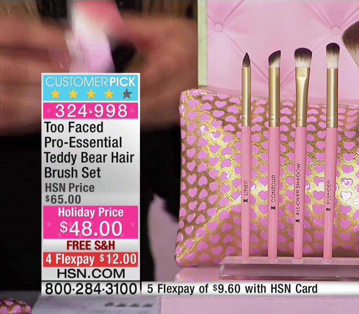 Host admiring the brush set.