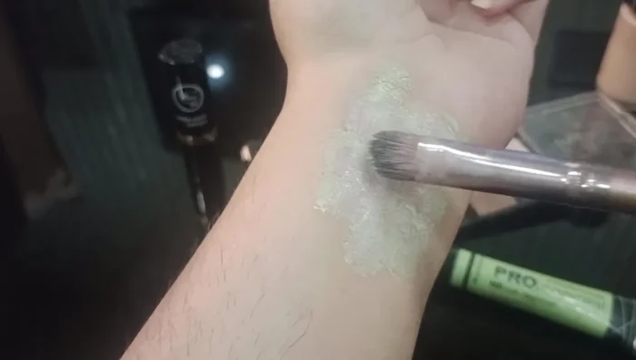 Apply skin-toned concealer and foundation to set the green corrector and create a flawless base.