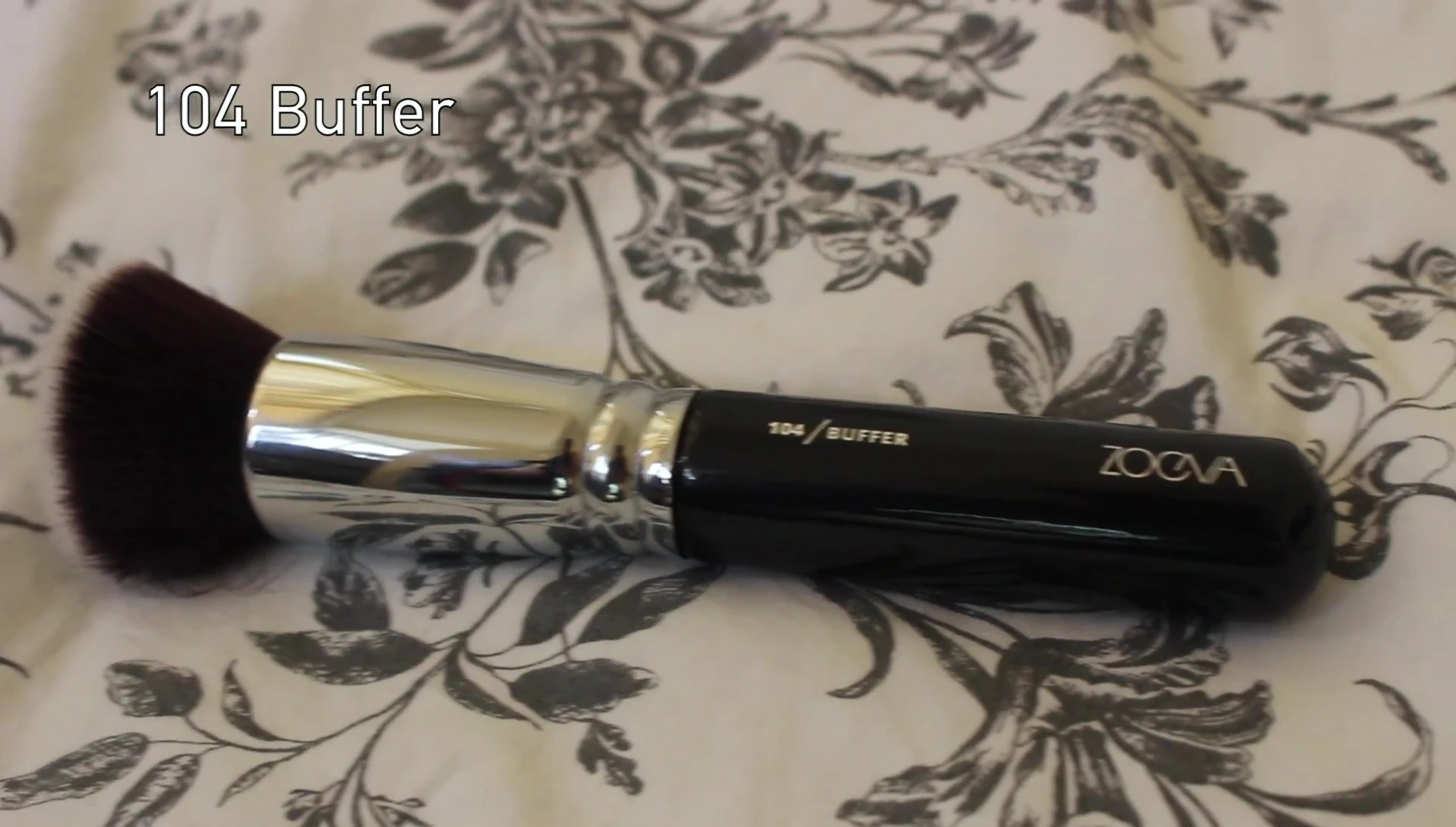 Comparison shot of the ZOEVA 104 Buffer Brush and a Sigma brush.