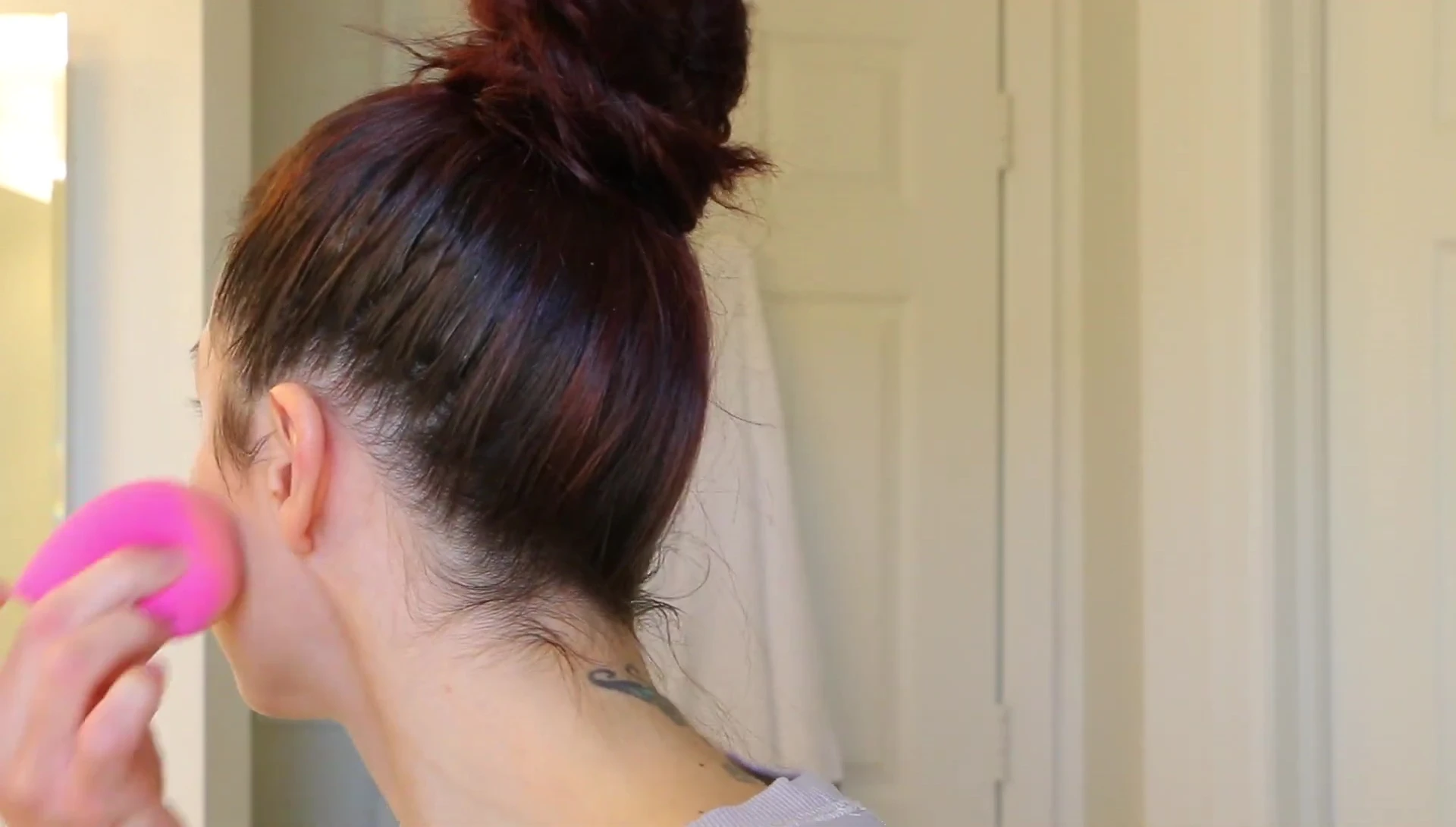 Applying concealer with the sponge