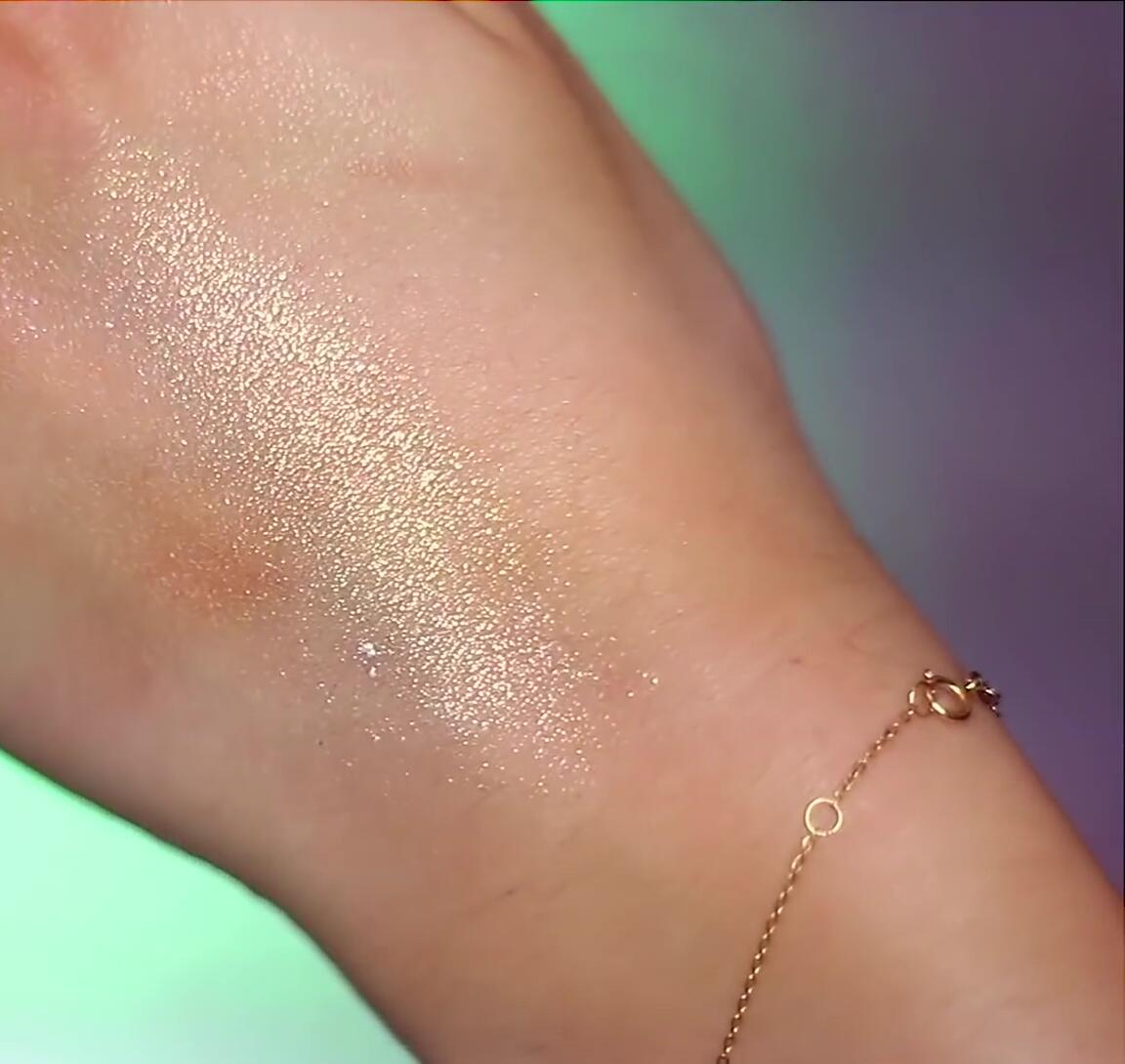 Applying cream highlighter