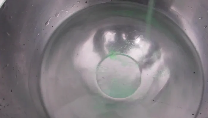 Fill the mascara tube with soapy water and use the wand to scrub the inside thoroughly. Remove the rubber component inside the tube using a fork and clean it separately.