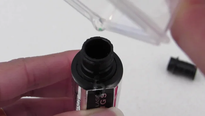 Fill the clean, dry tube with your favorite lash or eyebrow serum and replace the rubber component.