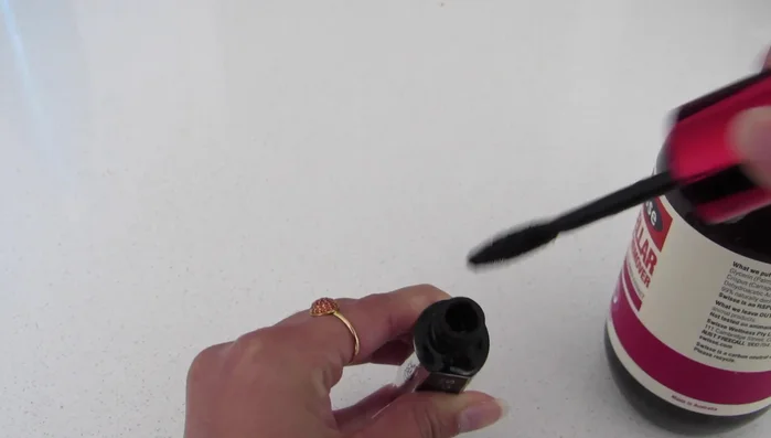 Pour makeup remover into the empty mascara tube and use the wand to loosen the mascara inside. Let it sit overnight (minimum 3 hours).