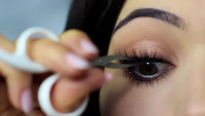 Apply mascara and lashes.