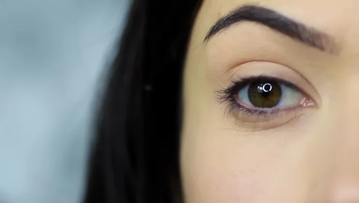 Blend the eyeshadow down onto the lid and back up towards the brow, leaving a small gap under the brow for contrast.