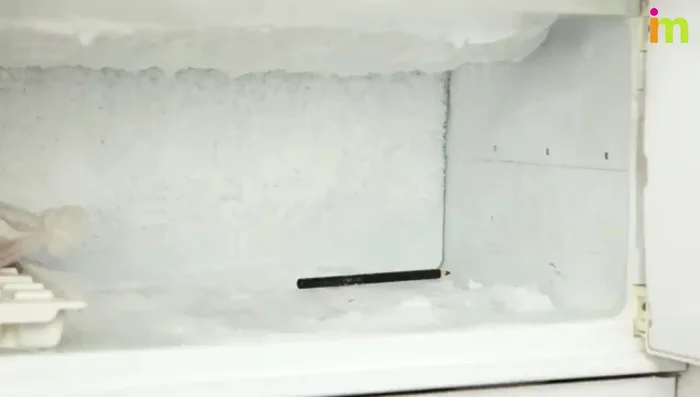 Sharpen the eyeliner by turning the pencil in the sharpener.