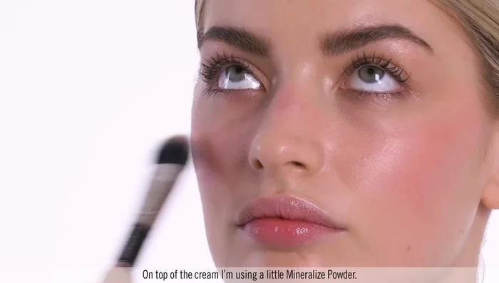 Set the cream blush with mineral powder to enhance the sun-kissed effect.