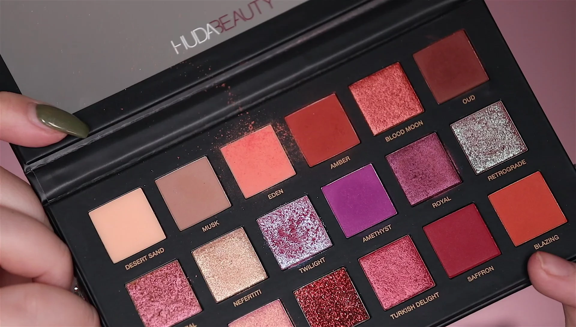 Close-up of the palette after use, showing slight powder buildup.