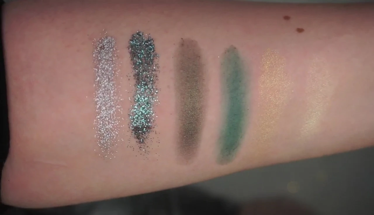 Swatches of the first row of eyeshadows.
