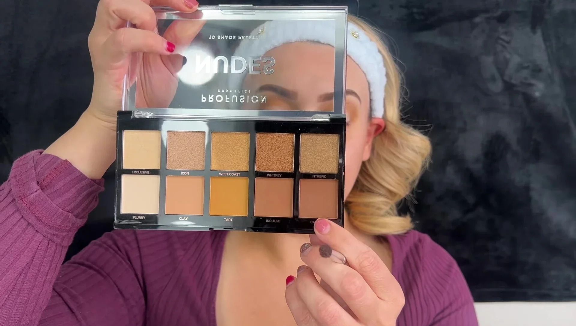 Applying 'Calvary' eyeshadow in the crease