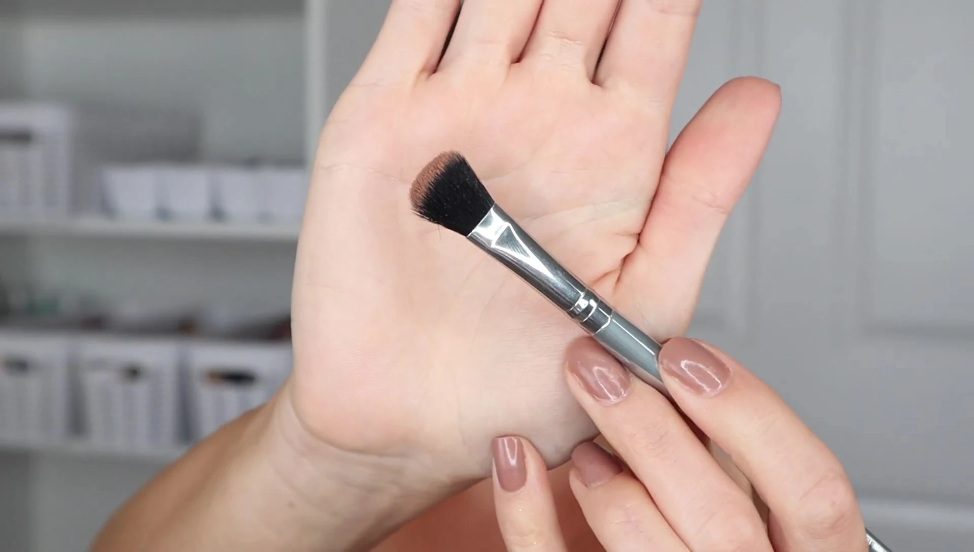 Smudging 'Toasty' on the lower lash line.