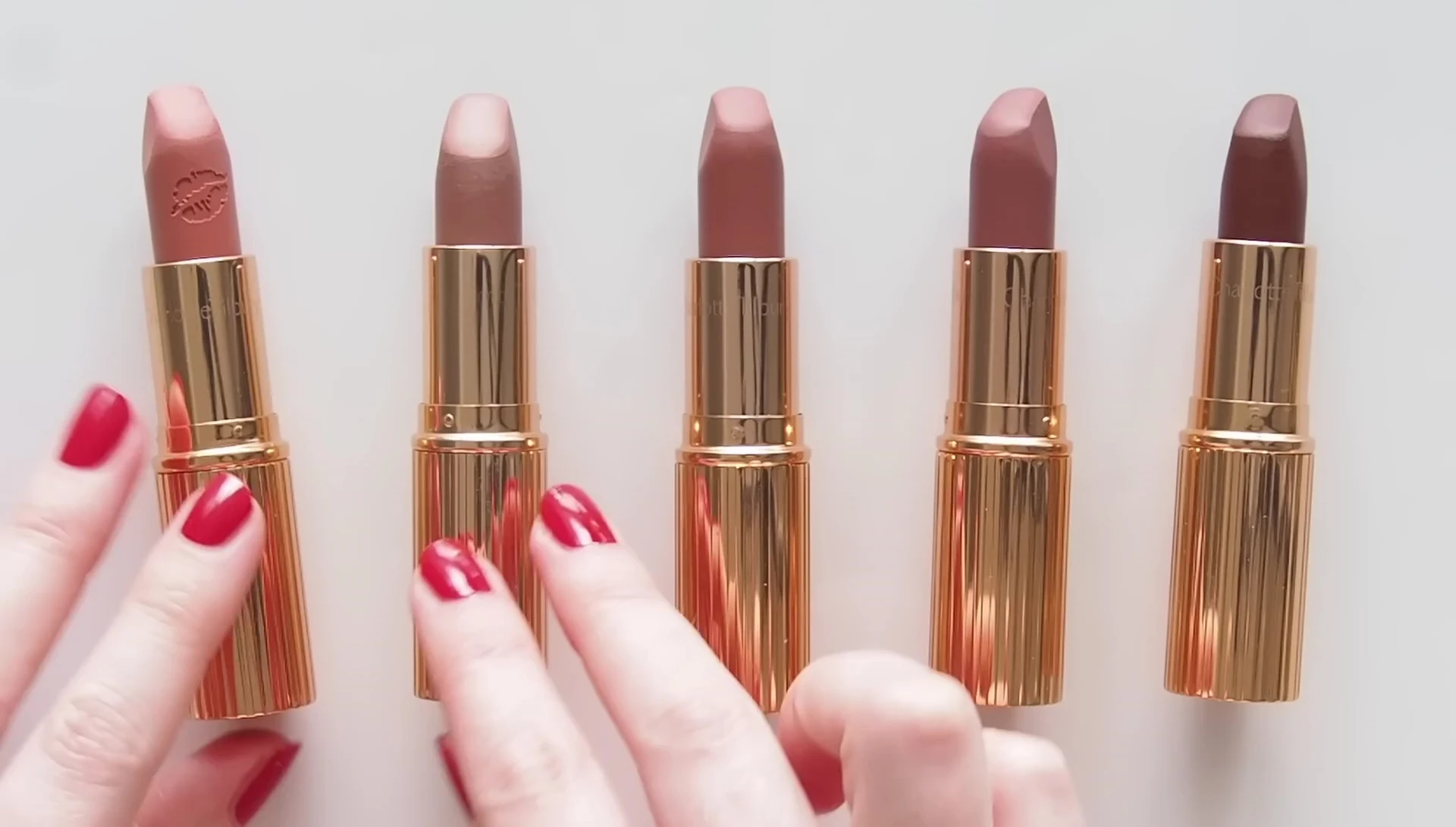Lipstick swatches grouped by color family (nudes)