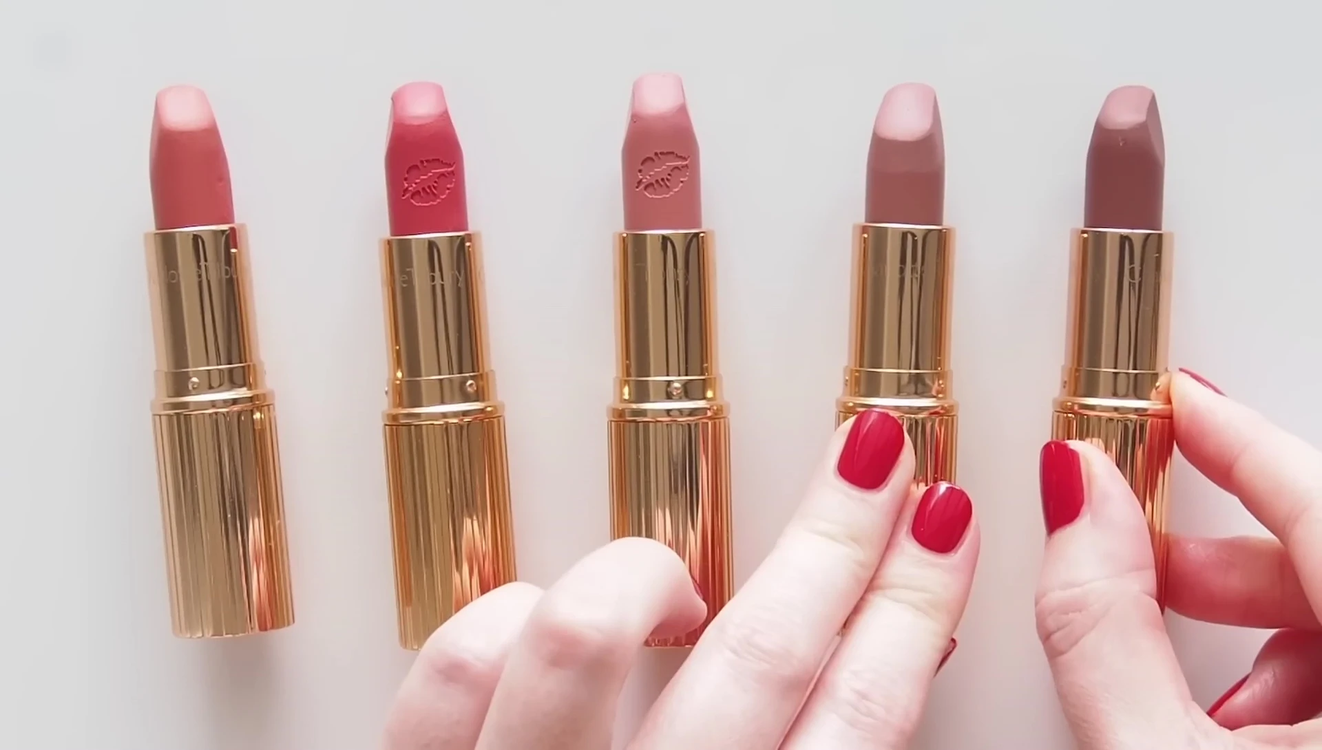 Lipstick swatches grouped by color family (pinks)
