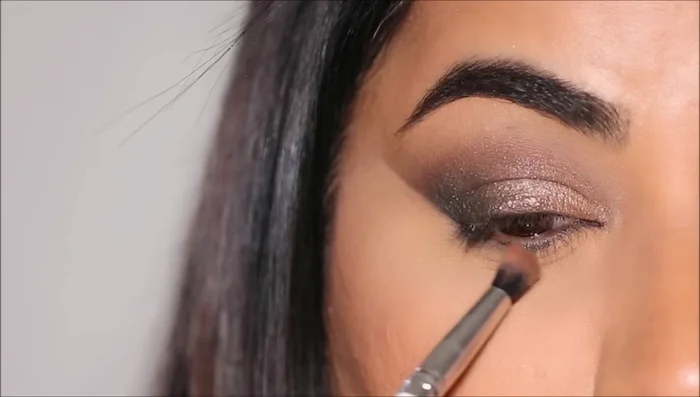 Apply eyeliner (remel scandalized pencil in Hypnotic Gold in the waterline and Urban Decay liquid liner in Black for a small wing).