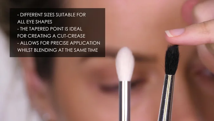 Use a small socket blender for precise application and blending of darker shades in the socket line or outer C shape.