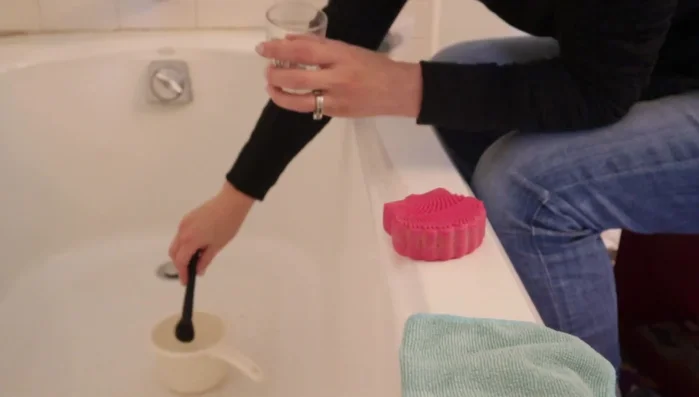 Wet brush hairs with warm water.