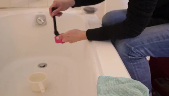 Gently swirl the brush on the cleaner to remove makeup residue.