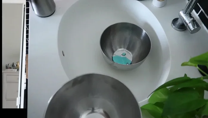 Add Dawn dish soap to the container.