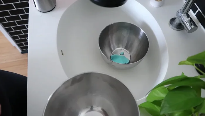 Add Dawn dish soap to the container.