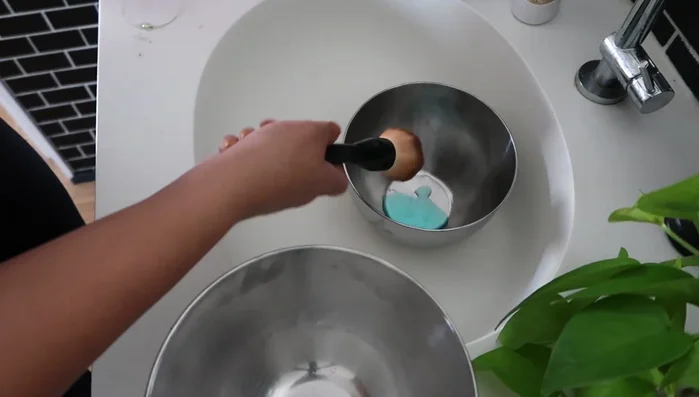 Add more Dawn dish soap and pour over the brushes.