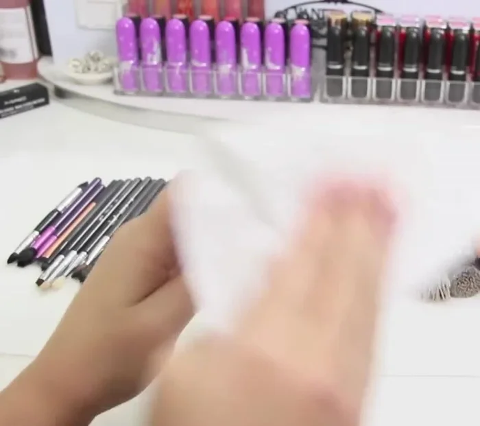 Reshape the brushes and lay them flat to dry, ideally using a brush guard or wrapping the handles with paper towels to absorb excess water and prevent lint from sticking.